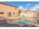 Private backyard features a sparkling pool, hardscape, and low-maintenance desert landscaping at 3917 E Morenci Rd, San Tan Valley, AZ 85143