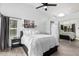 Relaxing bedroom with a window, skylight, high ceiling and a mirror door closet at 4013 E Woodland Dr, Phoenix, AZ 85048