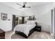 This main bedroom is naturally well lit with its sliding glass door and high ceilings at 4013 E Woodland Dr, Phoenix, AZ 85048