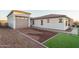 Charming single-Gathering home with a 2-car garage, gravel driveway, and tidy landscaping at 43720 N Acadia Way, New River, AZ 85087