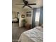 This carpeted bedroom boasts a ceiling fan, slider closet, and relaxing atmosphere at 4537 N 26Th Dr, Phoenix, AZ 85017
