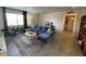 Spacious living room with comfortable seating, stylish rug, and plenty of natural light at 4537 N 26Th Dr, Phoenix, AZ 85017