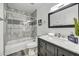 Well-appointed bathroom with a shower-tub combo and a modern vanity at 6525 N 83Rd St, Scottsdale, AZ 85250