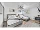 Comfortable bedroom featuring two beds, a ceiling fan, and natural light at 6525 N 83Rd St, Scottsdale, AZ 85250