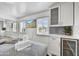 Bedroom with a wet bar and a small beverage refrigerator at 6525 N 83Rd St, Scottsdale, AZ 85250