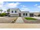 Modern home with a xeriscaped front yard, desert landscaping, and a contemporary design at 6525 N 83Rd St, Scottsdale, AZ 85250