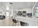 Bright kitchen featuring stainless steel appliances, an eat-in bar, and modern finishes at 6525 N 83Rd St, Scottsdale, AZ 85250