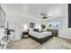Tranquil bedroom featuring a king-size bed, modern decor, and ample natural light at 6525 N 83Rd St, Scottsdale, AZ 85250