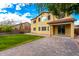 Backyard with a paver patio, lawn, and view of the home's exterior at 7975 W Andrea Dr, Peoria, AZ 85383