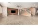 Open-concept room with a ceiling fan, tile floor, staircase and neutral walls at 7975 W Andrea Dr, Peoria, AZ 85383