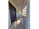 Covered walkway to front door featuring modern lighting and view of the property at 8002 N 5Th Ave, Phoenix, AZ 85021