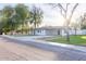 This property features a spacious driveway and a covered parking area, providing convenience and protection at 8002 N 5Th Ave, Phoenix, AZ 85021