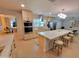 Bright kitchen featuring a large island with quartz countertop and modern appliances at 8002 N 5Th Ave, Phoenix, AZ 85021