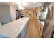 Bright kitchen featuring a large island with quartz countertop, modern appliances and ample cabinetry at 8002 N 5Th Ave, Phoenix, AZ 85021