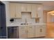 Stylish kitchen sink with quartz countertops, elegant hardware, and tile backsplash at 8002 N 5Th Ave, Phoenix, AZ 85021