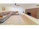 Spacious living room with unique fireplace, tiled floors and plenty of natural light at 8002 N 5Th Ave, Phoenix, AZ 85021