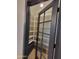 Walk-in pantry featuring a glass paneled door and ample shelving for optimal organization at 8002 N 5Th Ave, Phoenix, AZ 85021