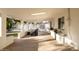 Large covered patio area with seating, offering a view of the fenced backyard and pool area at 8002 N 5Th Ave, Phoenix, AZ 85021