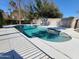 Spacious backyard pool with a large deck area, perfect for relaxation and outdoor activities at 8002 N 5Th Ave, Phoenix, AZ 85021