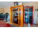 Garage with an infrared sauna, weightlifting equipment, and storage, ideal for fitness and relaxation at 801 W Tyson St, Chandler, AZ 85225