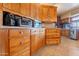 Detailed view of kitchen cabinets and appliances, showcasing ample storage and functionality at 801 W Tyson St, Chandler, AZ 85225