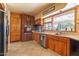 Well-equipped kitchen features stainless steel appliances, wood cabinetry, and a practical layout at 801 W Tyson St, Chandler, AZ 85225