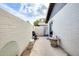 Backyard view with a concrete patio enclosed by a privacy wall at 828 W Laguna Dr, Tempe, AZ 85282