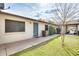 Inviting single-story home featuring desert landscaping, a walkway, and a covered parking area at 828 W Laguna Dr, Tempe, AZ 85282