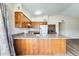 Bright kitchen showcasing extensive cabinet space, modern appliances, and a functional island at 828 W Laguna Dr, Tempe, AZ 85282