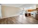 Open-concept living area with modern flooring, plenty of natural light, and seamless flow to the kitchen at 828 W Laguna Dr, Tempe, AZ 85282