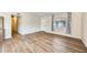 Comfortable living area with modern floors, lots of light, and an open layout at 828 W Laguna Dr, Tempe, AZ 85282