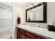 Well-lit bathroom features granite countertop and updated fixtures at 9355 N 91St St # 201, Scottsdale, AZ 85258