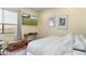 Bedroom with a TV, patterned rug, and a decorative wooden chest at 9869 E Davenport Dr, Scottsdale, AZ 85260