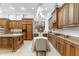 Well-appointed kitchen with granite countertops, a central island, and ample storage space at 9869 E Davenport Dr, Scottsdale, AZ 85260