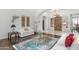 Spacious living room showcasing stylish decor, an arched entryway, and a grand front door at 9869 E Davenport Dr, Scottsdale, AZ 85260