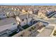 An aerial view of the property displaying its low maintenance backyard and neighborhood at 9923 E Texas Ave, Mesa, AZ 85212