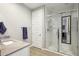 Modern bathroom with a glass enclosed shower and stone countertops at 9923 E Texas Ave, Mesa, AZ 85212