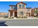 Charming two-story home featuring stucco siding, a tile roof, and a well-maintained front yard at 9923 E Texas Ave, Mesa, AZ 85212