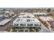 An aerial shot of the neighborhood showing the unit rooftops and the mature landscaping at 1111 E Missouri Ave # 9, Phoenix, AZ 85014