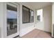 This unit balcony has views of the community buildings on a bright sunny day at 1111 E Missouri Ave # 9, Phoenix, AZ 85014