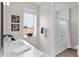 Bright bathroom with a single sink, modern fixtures, and a separate tub and shower at 1111 E Missouri Ave # 9, Phoenix, AZ 85014