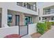 Modern townhome with a private gated patio area, contemporary architecture, and well-maintained landscaping at 1111 E Missouri Ave # 9, Phoenix, AZ 85014