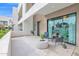 Outdoor patio with neutral decor, comfortable seating, and sliding glass door, perfect for relaxing and entertaining at 1111 E Missouri Ave # 9, Phoenix, AZ 85014