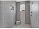 Modern walk-in shower with sleek tile, glass door, and convenient shower niche at 1111 E Missouri Ave # 9, Phoenix, AZ 85014