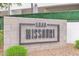Community signage for 1111 Missouri address in a landscaped setting at 1111 E Missouri Ave # 9, Phoenix, AZ 85014