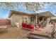 Large backyard showcasing a covered patio and an inviting outdoor seating area at 11123 E Olla Ave, Mesa, AZ 85212
