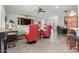 Bright and airy living room with a large entertainment center and comfortable seating arrangement at 11123 E Olla Ave, Mesa, AZ 85212