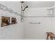 Close up of a tiled shower with modern fixtures and a built in niche at 11123 E Olla Ave, Mesa, AZ 85212