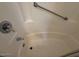 The shower features a shower head and a grab bar for safety at 11189 W Cameo Dr, Sun City, AZ 85351