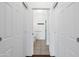 Bathroom featuring a walk-in shower, tiled floors, grab bars, and white walls at 11260 N 92Nd St # 1060, Scottsdale, AZ 85260